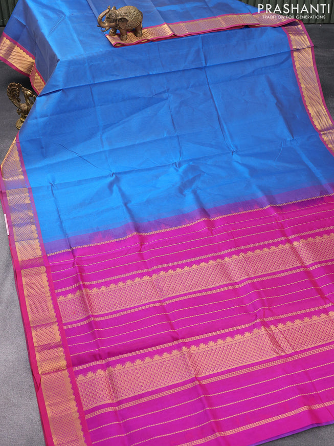 Silk cotton saree dual shade of cs blue and purple with plain body and zari woven border