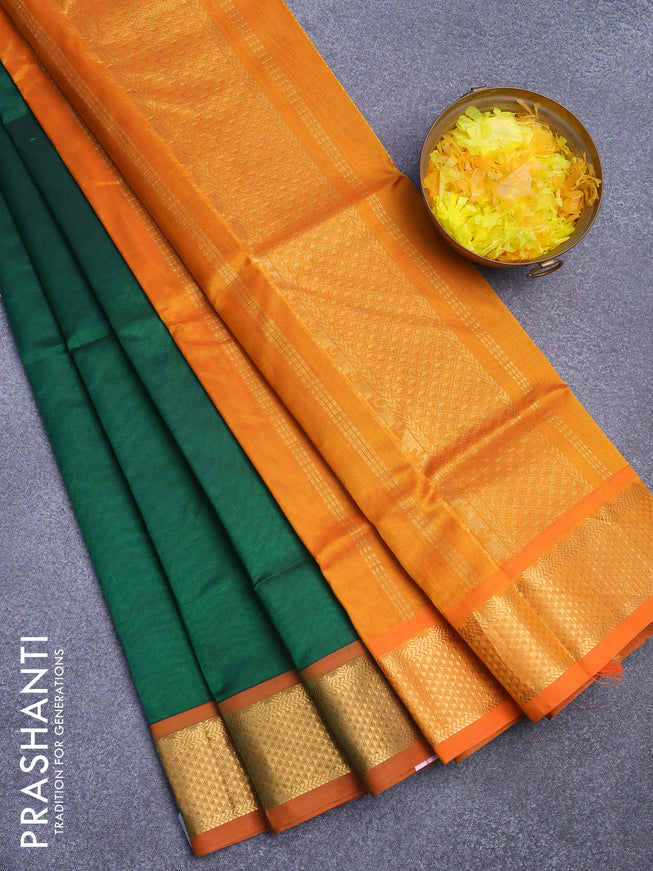 Silk cotton saree green green and orange with plain body and zari woven border