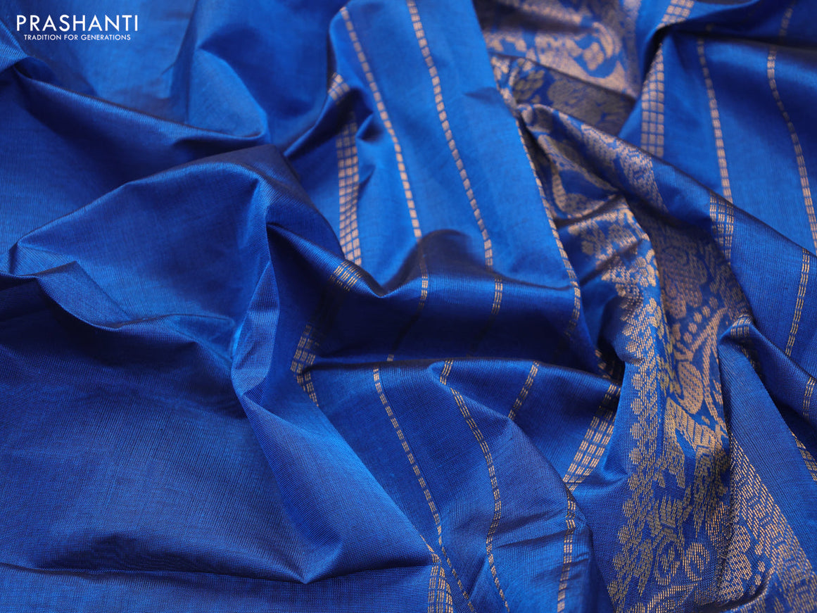 Silk cotton saree peacock blue with plain body and zari woven border