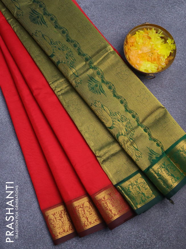 Silk cotton saree red and bottle green with plain body and zari woven border