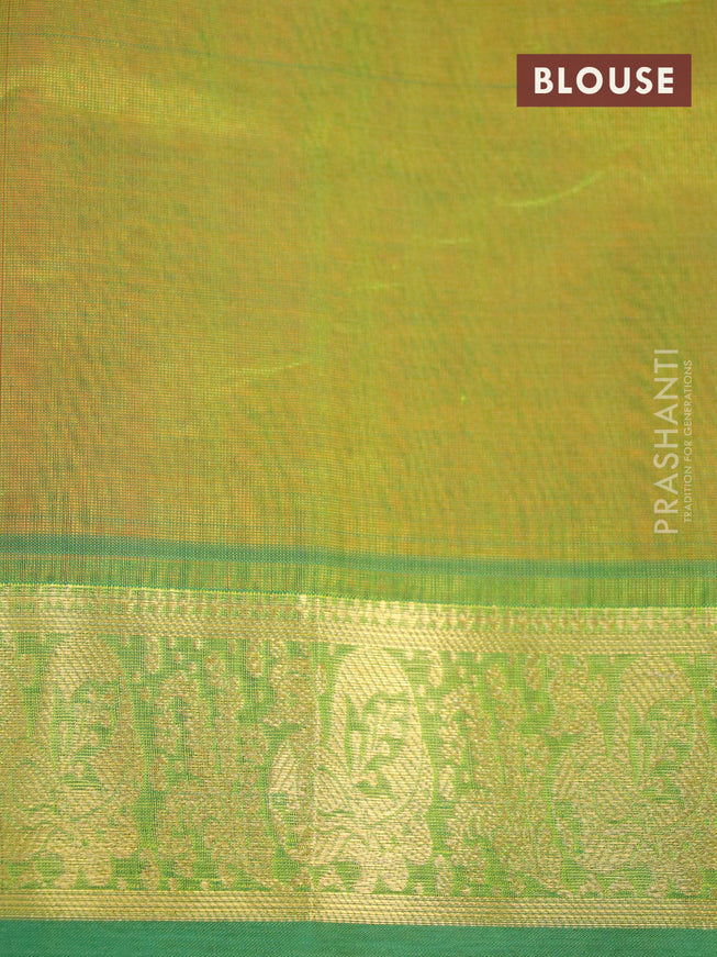 Silk cotton saree orange and green with plain body and zari woven border