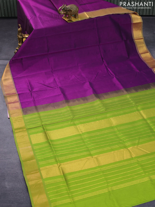 Silk cotton saree deep purple and light green with plain body and zari woven border