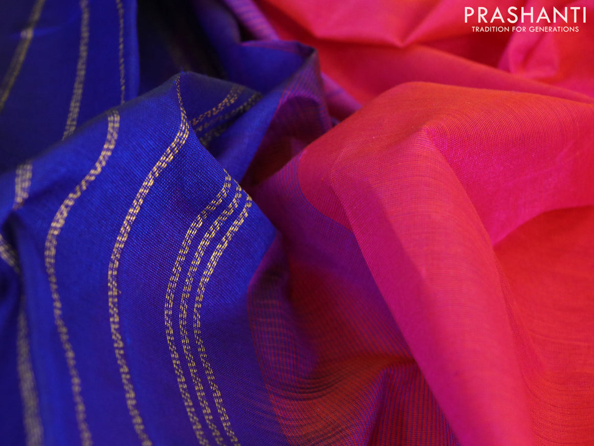 Silk cotton saree dual shade of pinkish orange and blue with plain body and zari woven border