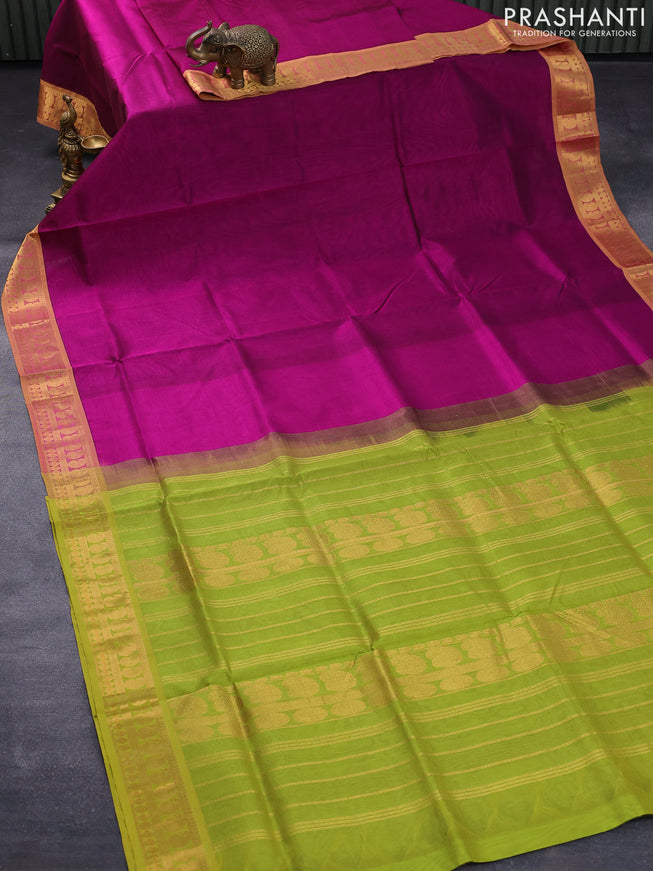 Silk cotton saree magenta pink and light green with plain body and paisley zari woven border