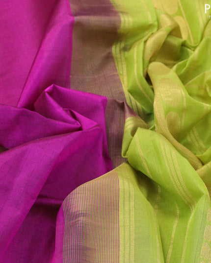 Silk cotton saree magenta pink and light green with plain body and paisley zari woven border