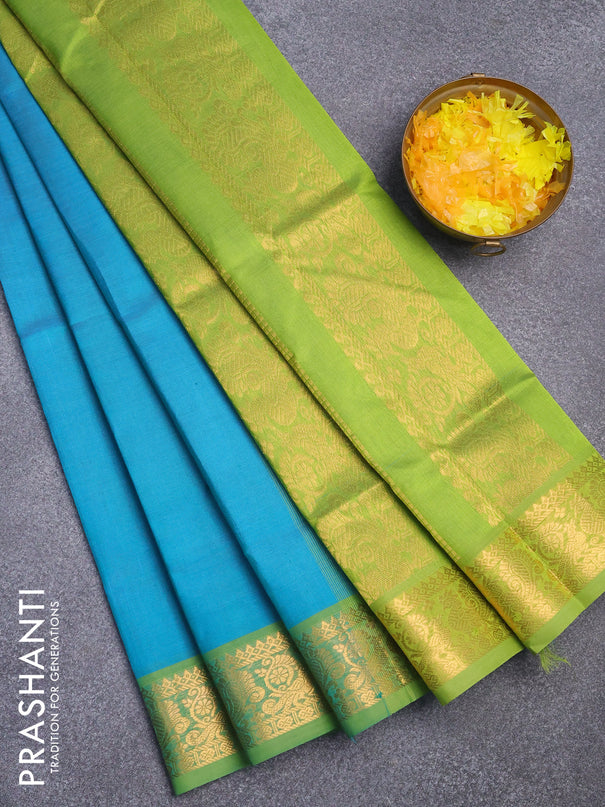 Silk cotton saree teal blue and light green with plain body and annam zari woven border