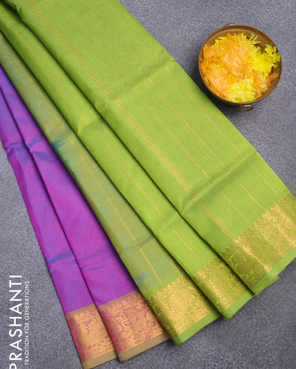 Silk cotton saree dual shade of bluish magenta pink and light green with plain body and annam zari woven border