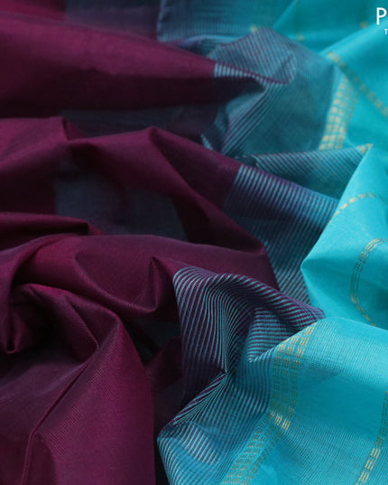Silk cotton saree wine shade and teal blue with plain body and annam zari woven border
