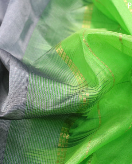 Silk cotton saree grey and light green with plain body and zari woven border