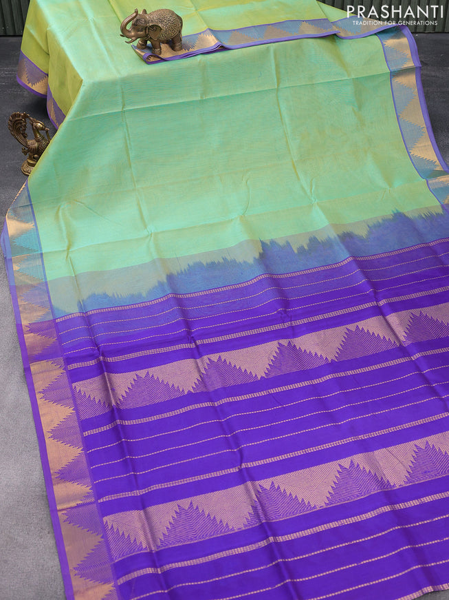 Silk cotton saree dual shade of green and blue with plain body and temple design zari woven border