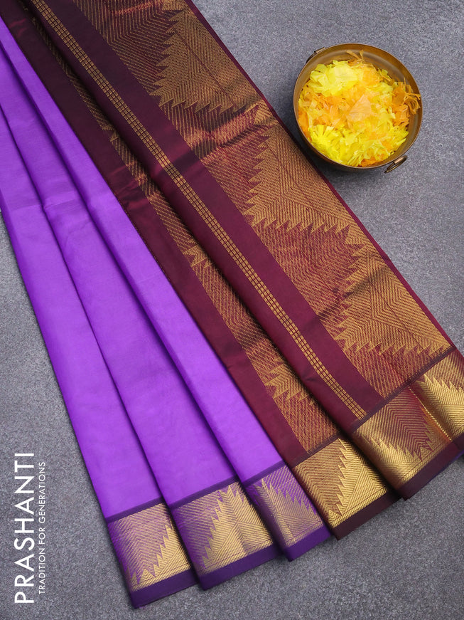 Silk cotton saree lavender shade and deep wine shade with plain body and temple design zari woven border