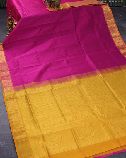 Silk cotton saree magenta pink and mustard yellow with plain body and zari woven border