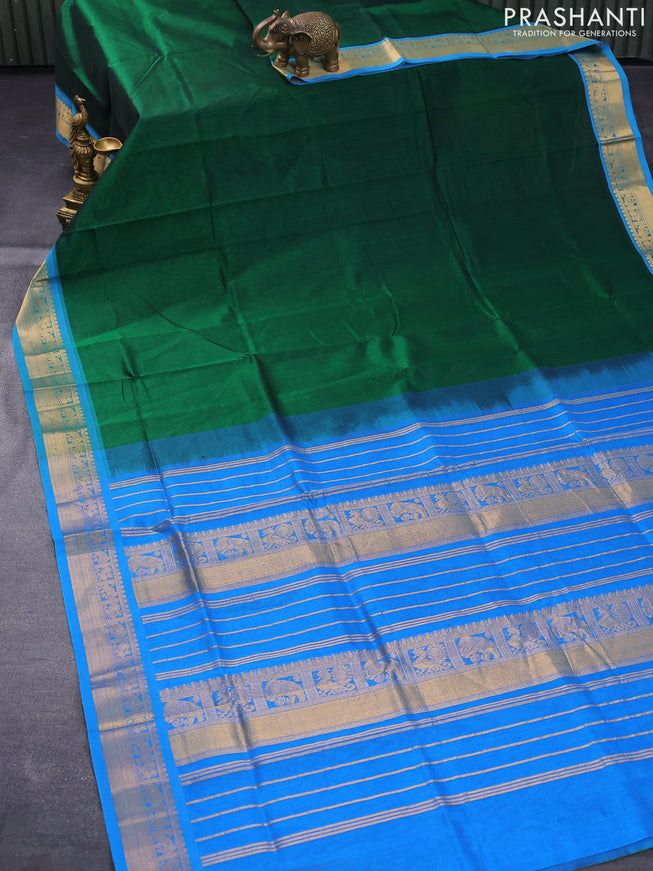 Silk cotton saree green and cs blue with plain body and zari woven border