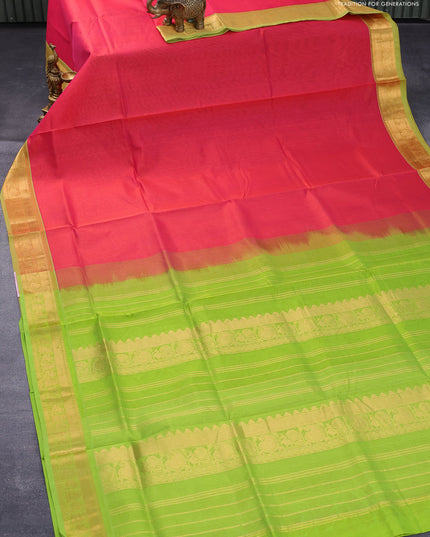 Silk cotton saree dual shade of pinkish orange and light green with plain body and zari woven border