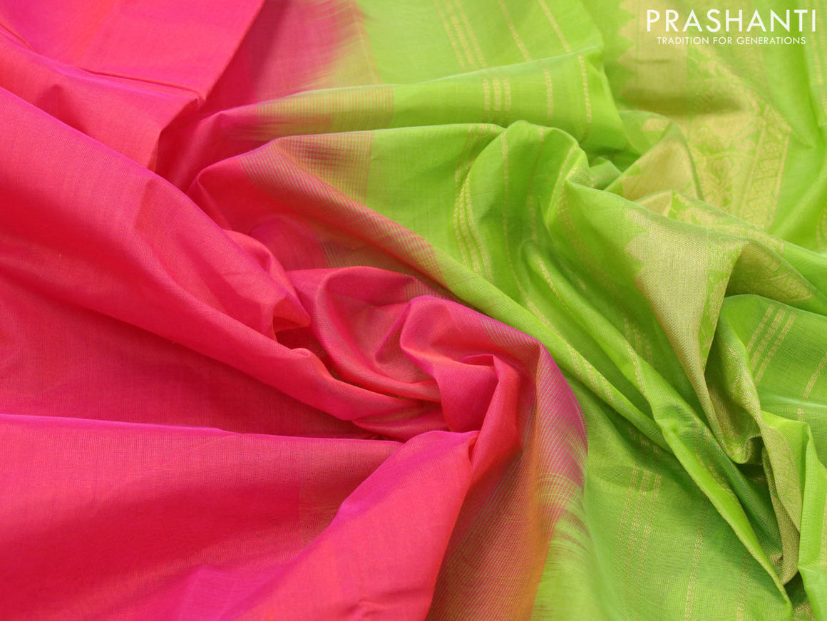 Silk cotton saree dual shade of pinkish orange and light green with plain body and zari woven border
