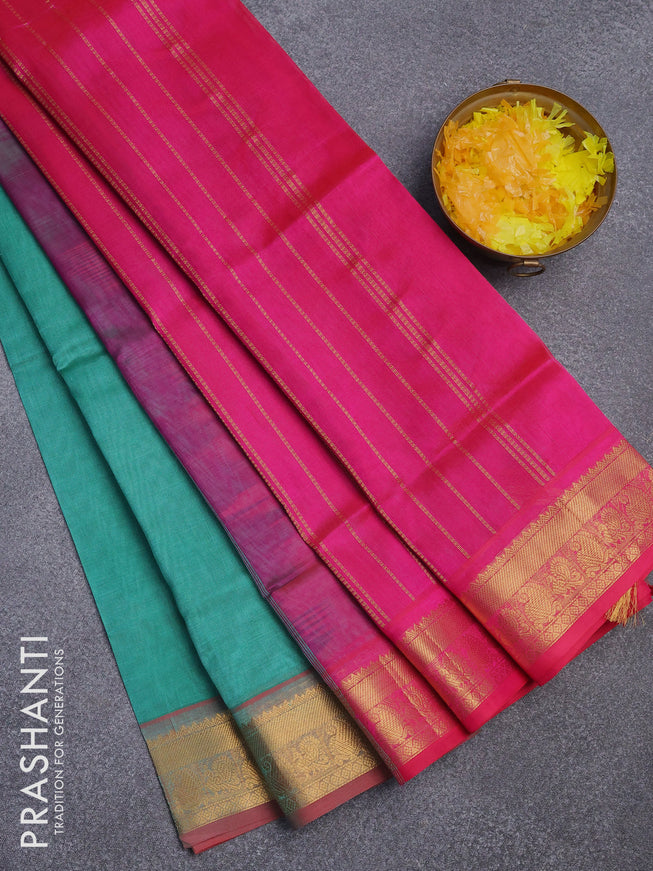 Silk cotton saree green and pink with plain body and zari woven border