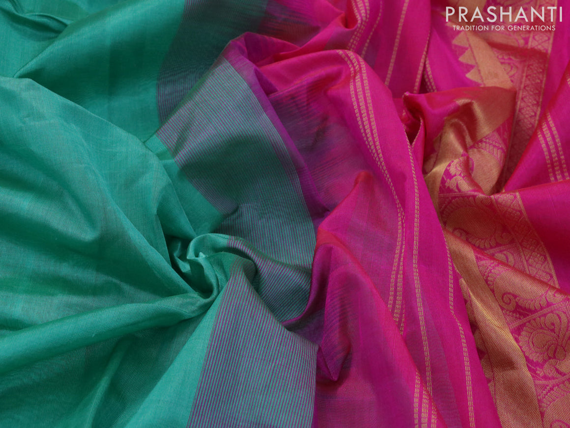 Silk cotton saree green and pink with plain body and zari woven border