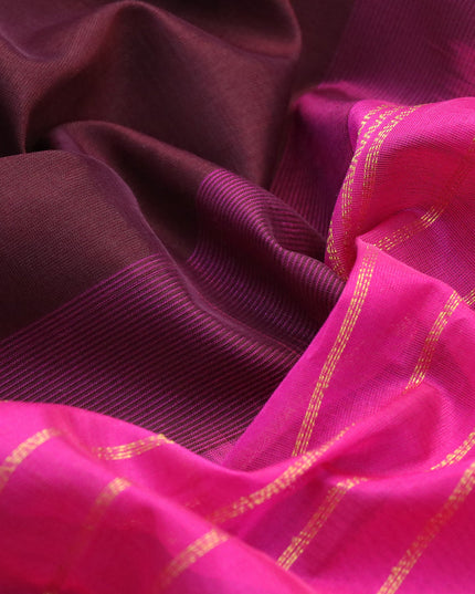 Silk cotton saree deep brown and magenta pink with plain body and zari woven border