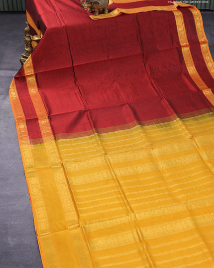 Silk cotton saree maroon and mustard yellow with plain body and rettapet zari woven border
