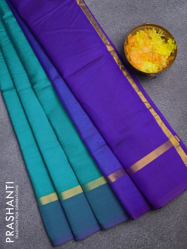 Silk cotton saree light blue and blue with plain body and zari woven simple border