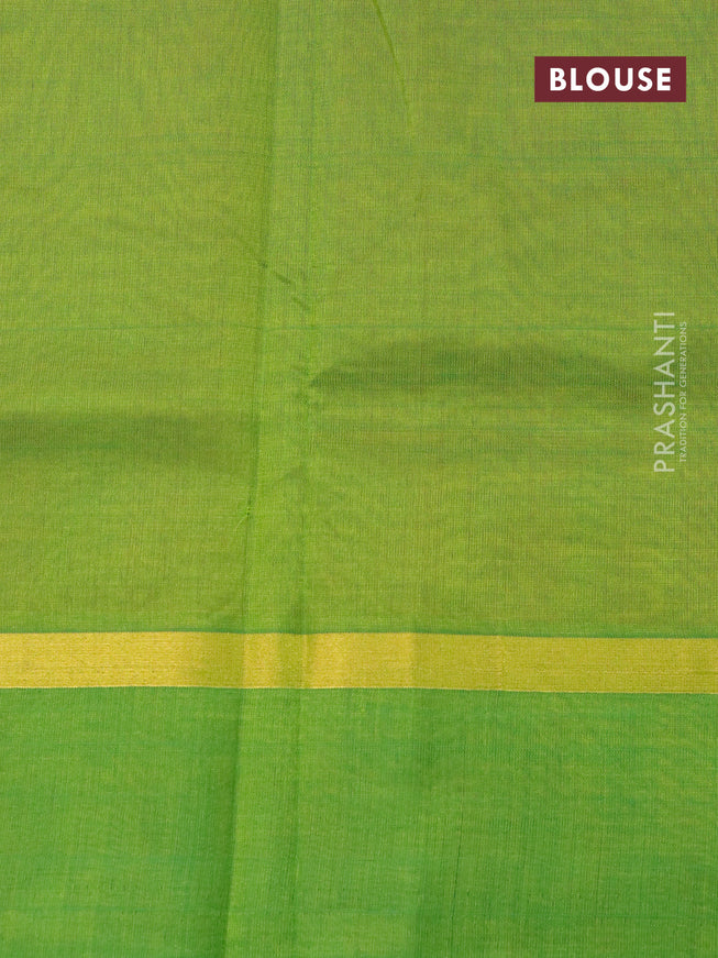 Silk cotton saree orange and light green with plain body and zari woven simple border