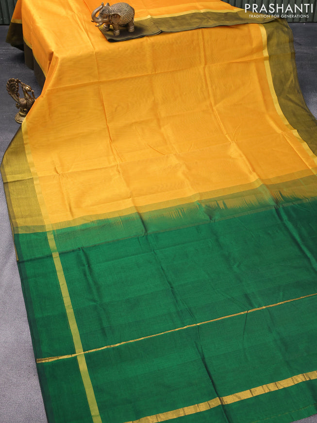 Silk cotton saree mango yellow and green with plain body and zari woven simple border
