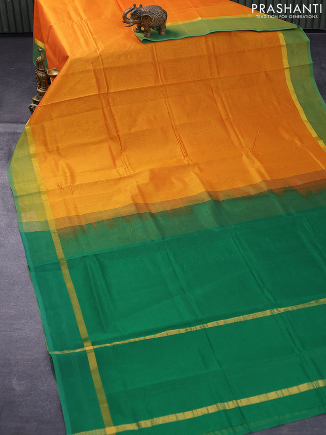 Silk cotton saree dual shade of yellow and green with plain body and zari woven simple border