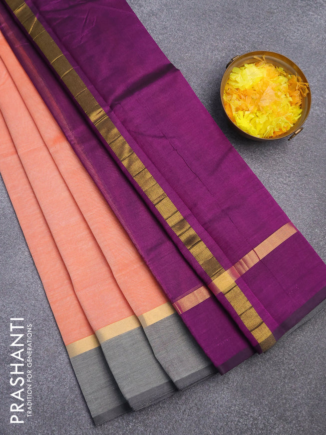 Silk cotton saree peach orange and deep purple with plain body and zari woven simple border