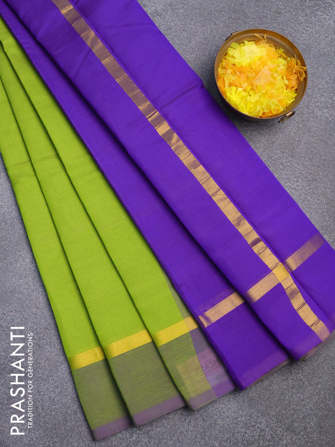 Silk cotton saree light green and blue with plain body and zari woven simple border
