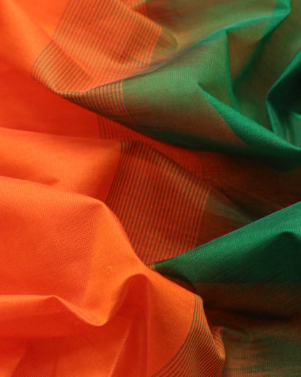 Silk cotton saree orange and green with plain body and zari woven simple border