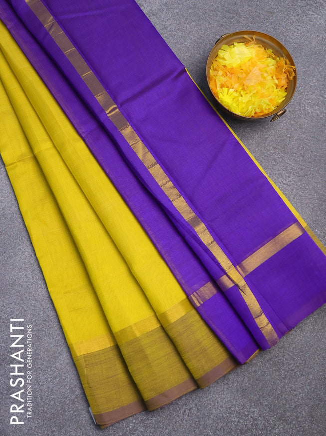 Silk cotton saree lime yellow and blue with plain body and zari woven simple border
