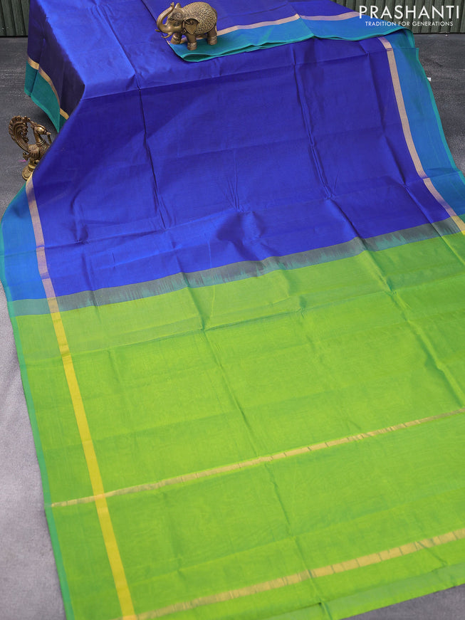 Silk cotton saree blue and green with plain body and zari woven simple border
