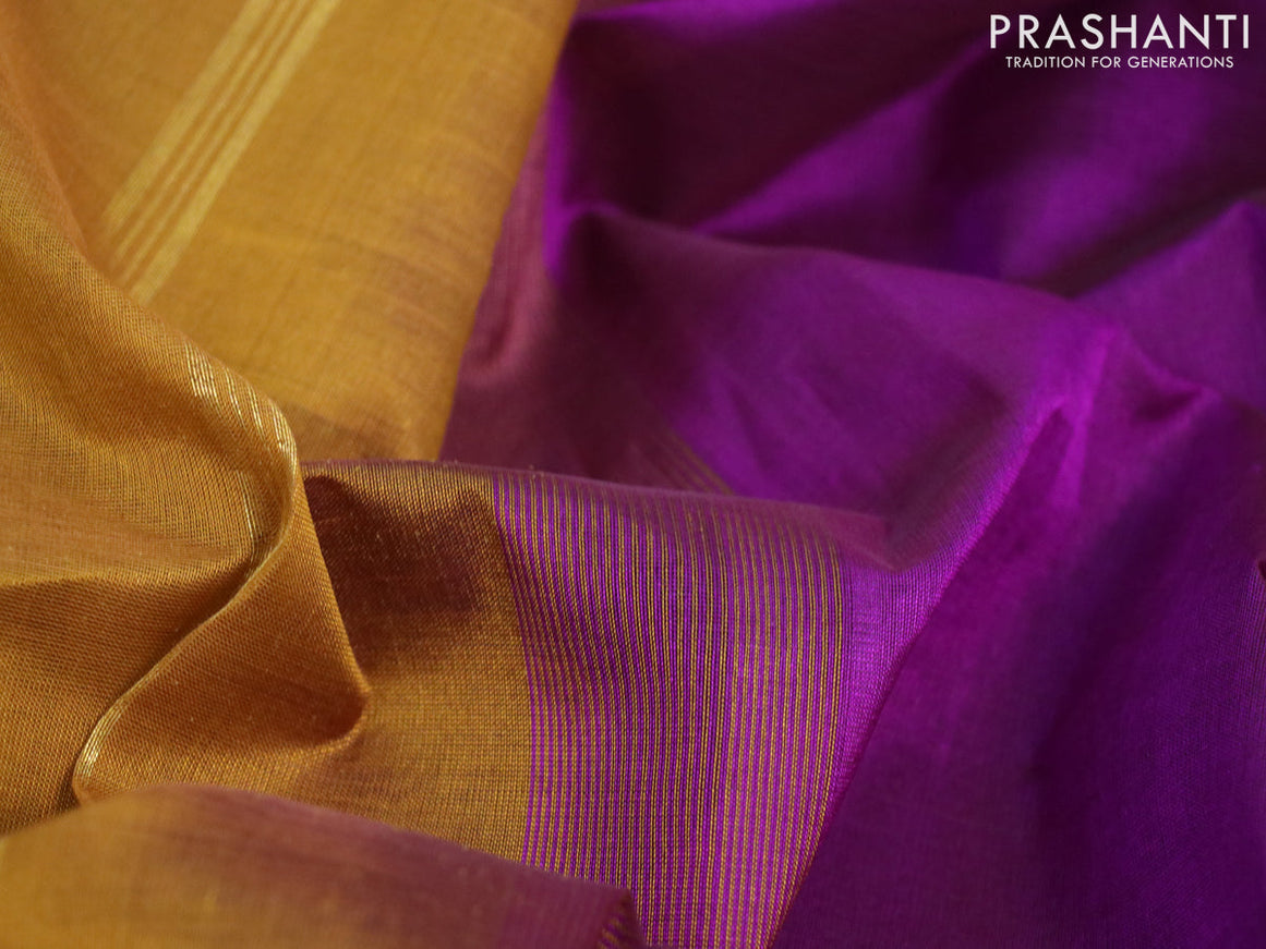 Silk cotton saree deep purple and mustard yellow with plain body and zari woven border
