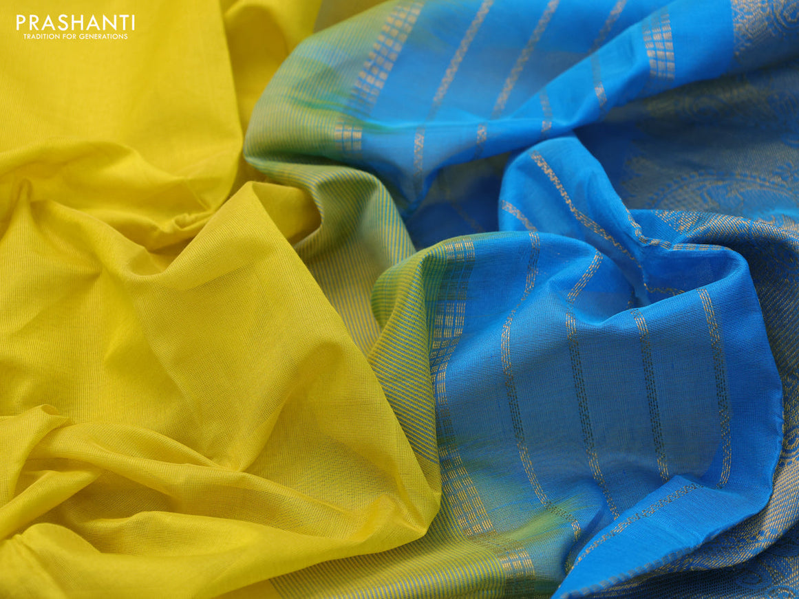 Silk cotton saree lime yellow and light blue with plain body and zari woven border