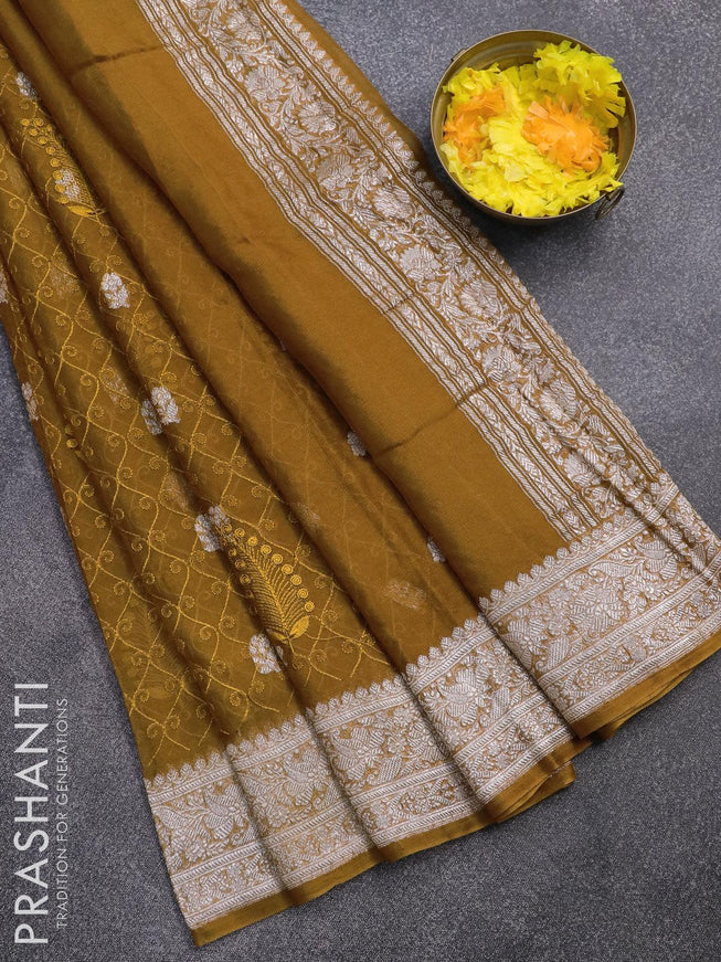 Banarasi chiffon saree dark mustard with allover chikankari work and silver zari woven border - {{ collection.title }} by Prashanti Sarees