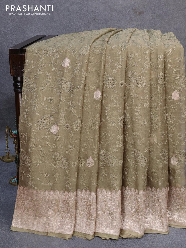 Banarasi chiffon silk saree elaichi green shade with allover chikankari work & silver zari buttas and silver zari woven border - {{ collection.title }} by Prashanti Sarees