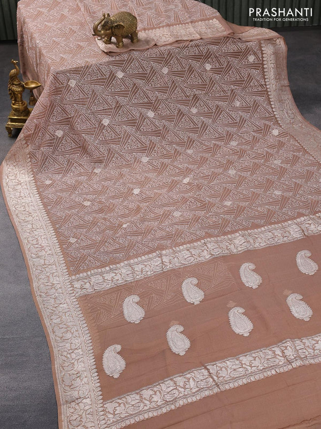 Banarasi chiffon silk saree pastel brown with allover chikankari work & silver zari buttas and silver zari woven border - {{ collection.title }} by Prashanti Sarees