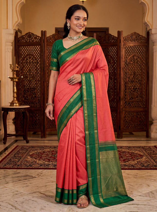 Pure kanchipuram silk saree peach shade and green with allover zari stripe pattern and rettapet zari woven korvai border