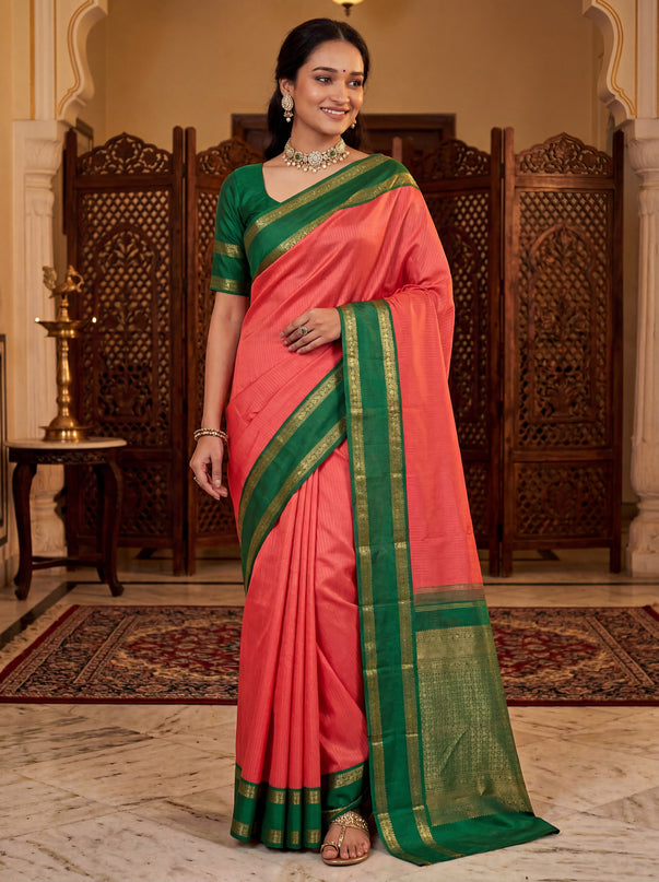 Pure kanchipuram silk saree peach shade and green with allover zari stripe pattern and rettapet zari woven korvai border