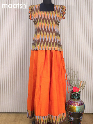 Cotton kids lehanga multi colour and sunset orange with allover ikat weaves and back knot for 16 years