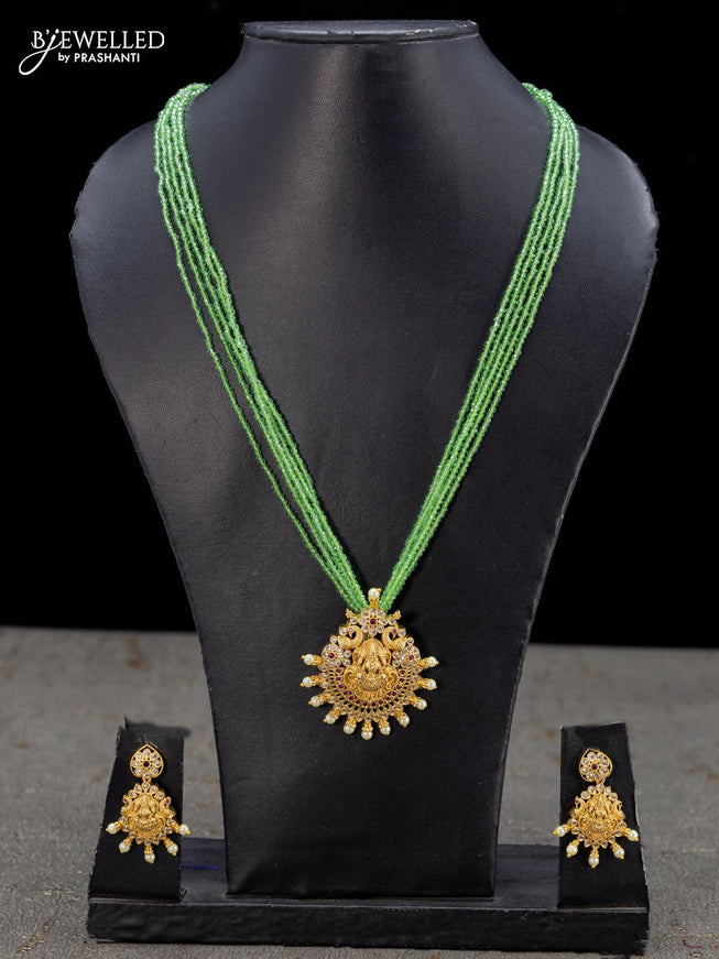 Crystal beaded light green necklace kemp & cz stone with lakshmi pendant and pearls - {{ collection.title }} by Prashanti Sarees