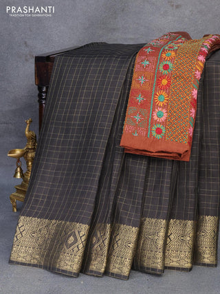 Dola silk saree black and brown with zari checked pattern and zari woven border with embroidery work blouse