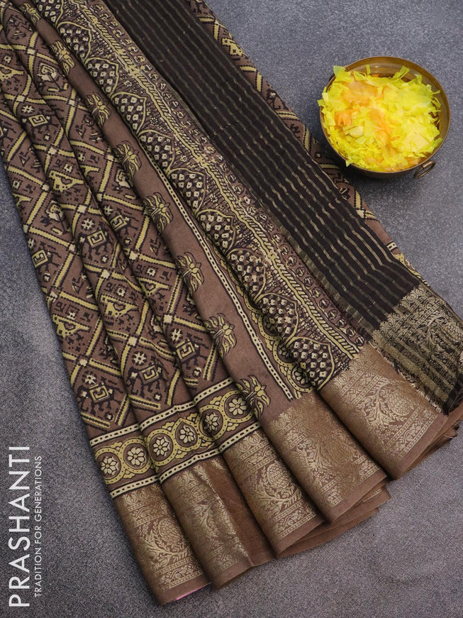 Dola silk saree brown shade with allover patola prints and ajrakh printed pallu - {{ collection.title }} by Prashanti Sarees