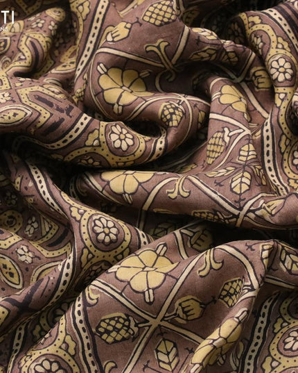 Dola silk saree chikku shade with allover ajrakh prints and zari woven floral border - {{ collection.title }} by Prashanti Sarees