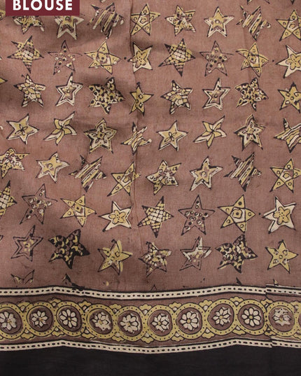 Dola silk saree chikku shade with allover ajrakh prints and zari woven floral border - {{ collection.title }} by Prashanti Sarees