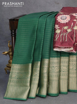 Dola silk saree green and deep maroon with allover zari woven stripes pattern and rich zari woven border