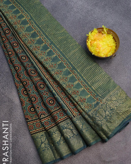 Dola silk saree green shade and pastel blue shade with allover ajrakh prints and zari woven floral border - {{ collection.title }} by Prashanti Sarees