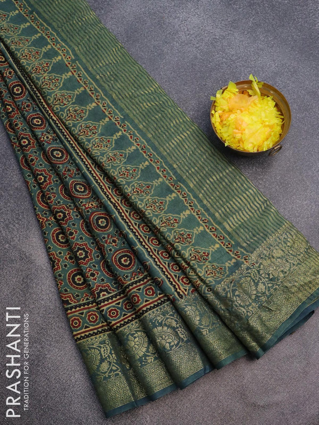 Dola silk saree green shade and pastel blue shade with allover ajrakh prints and zari woven floral border - {{ collection.title }} by Prashanti Sarees