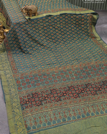 Dola silk saree green with allover butta prints and zari woven floral border - {{ collection.title }} by Prashanti Sarees