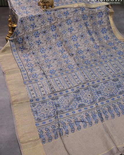 Dola silk saree grey with allover ajrakh prints and zari woven floral border - {{ collection.title }} by Prashanti Sarees